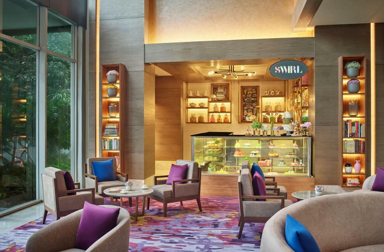 ホテル ビバンタ コルカタ Em バイパス エクステリア 写真 The Swirl Lounge at the airport